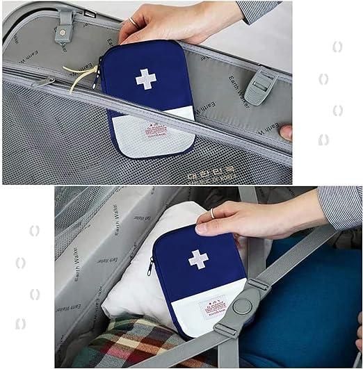 First aid kit in a travel bag with a person holding it.